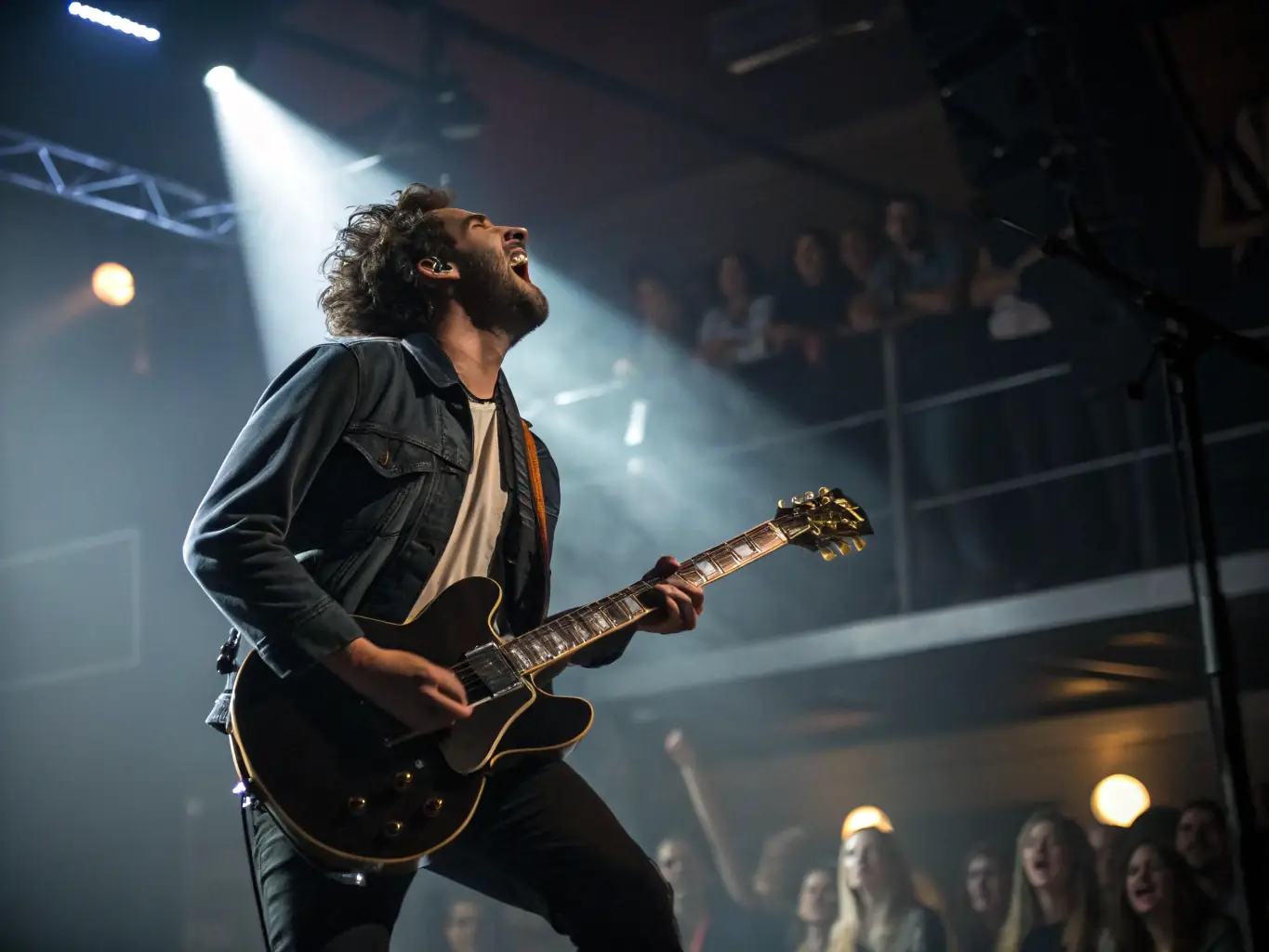A vibrant image of a musician performing on stage during a live concert organized by ASSOCIATION EM PROD, showcasing the energy and talent of emerging musical artists.